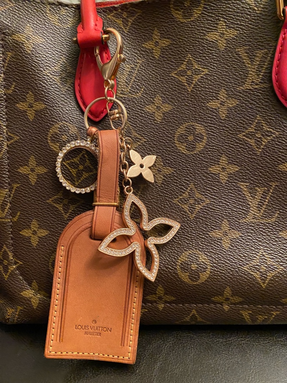 Louis Vuitton Brown Leather Tag with Crystal Flower Charm and Gold Hardware